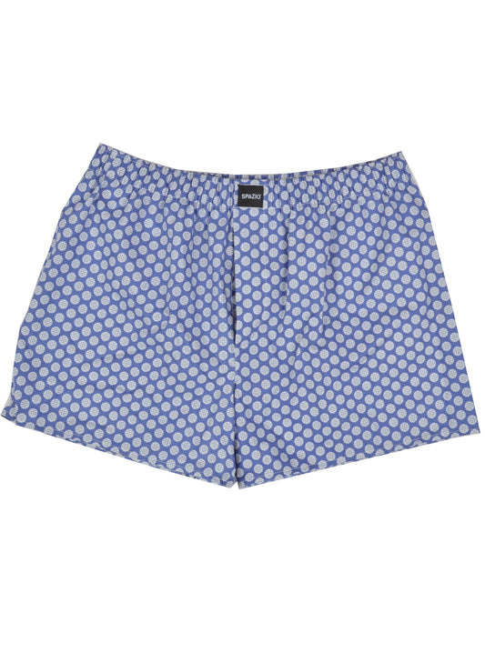 blue boxer shorts with a white circular pattern on a white background