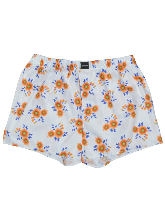 white boxers with a yellow floral pattern with blue leaves on a white background