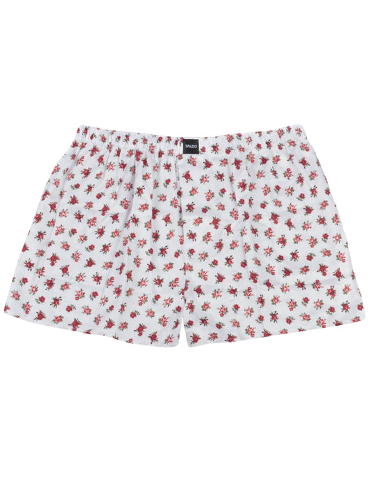 Floral patterned shorts on a white background